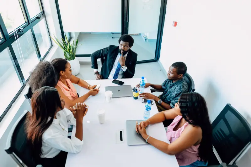 Team collaborating around a table